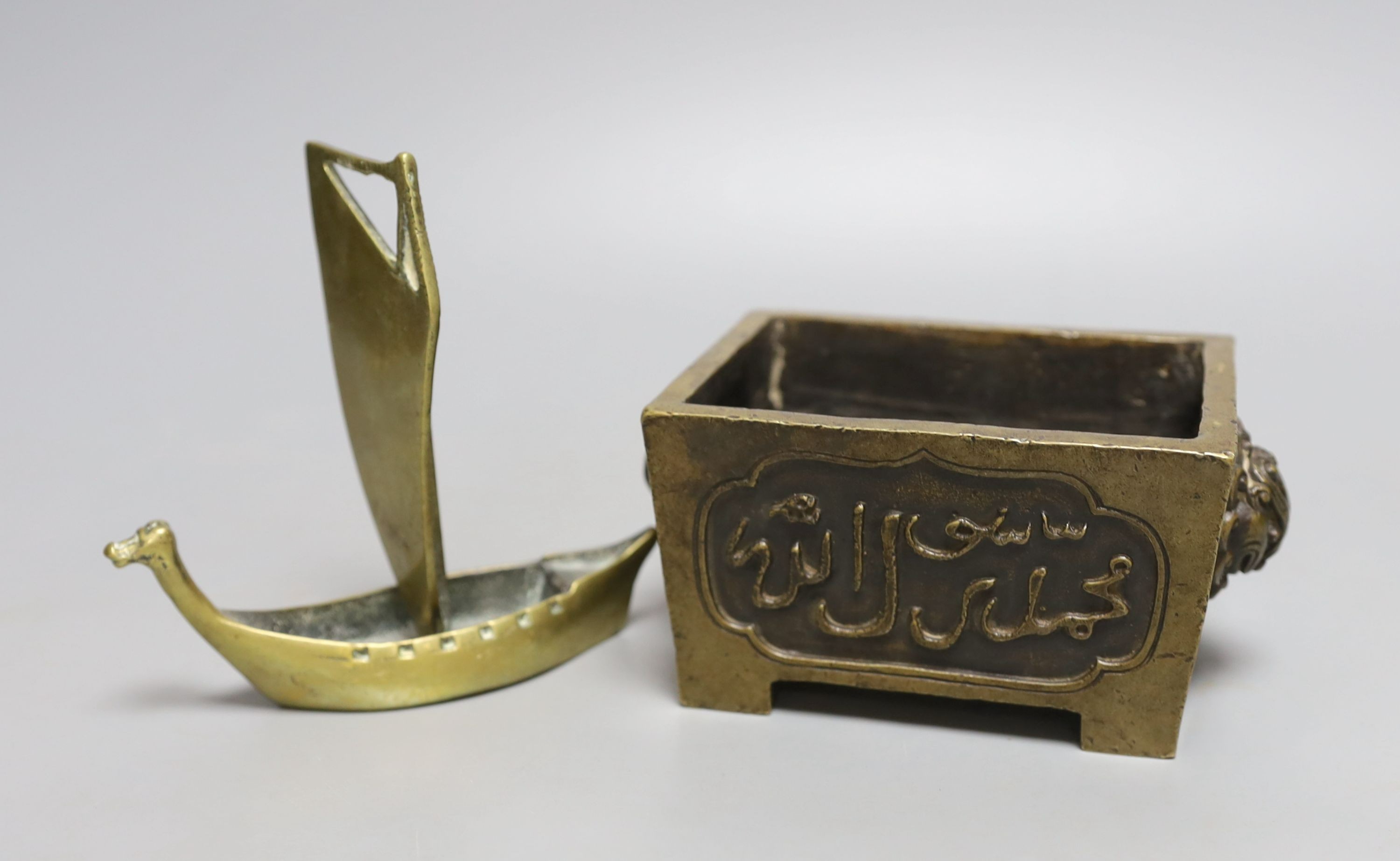 A Chinese bronze censer and a bronze boat